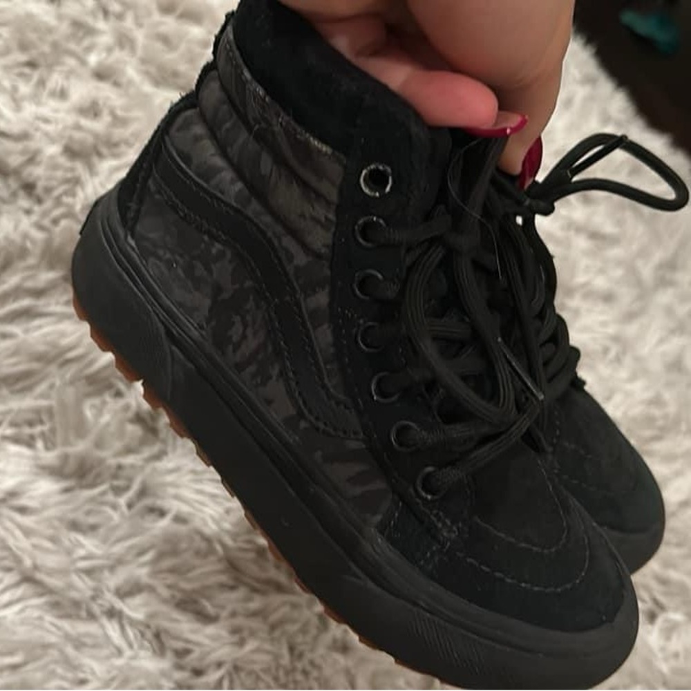 Black high top Vans